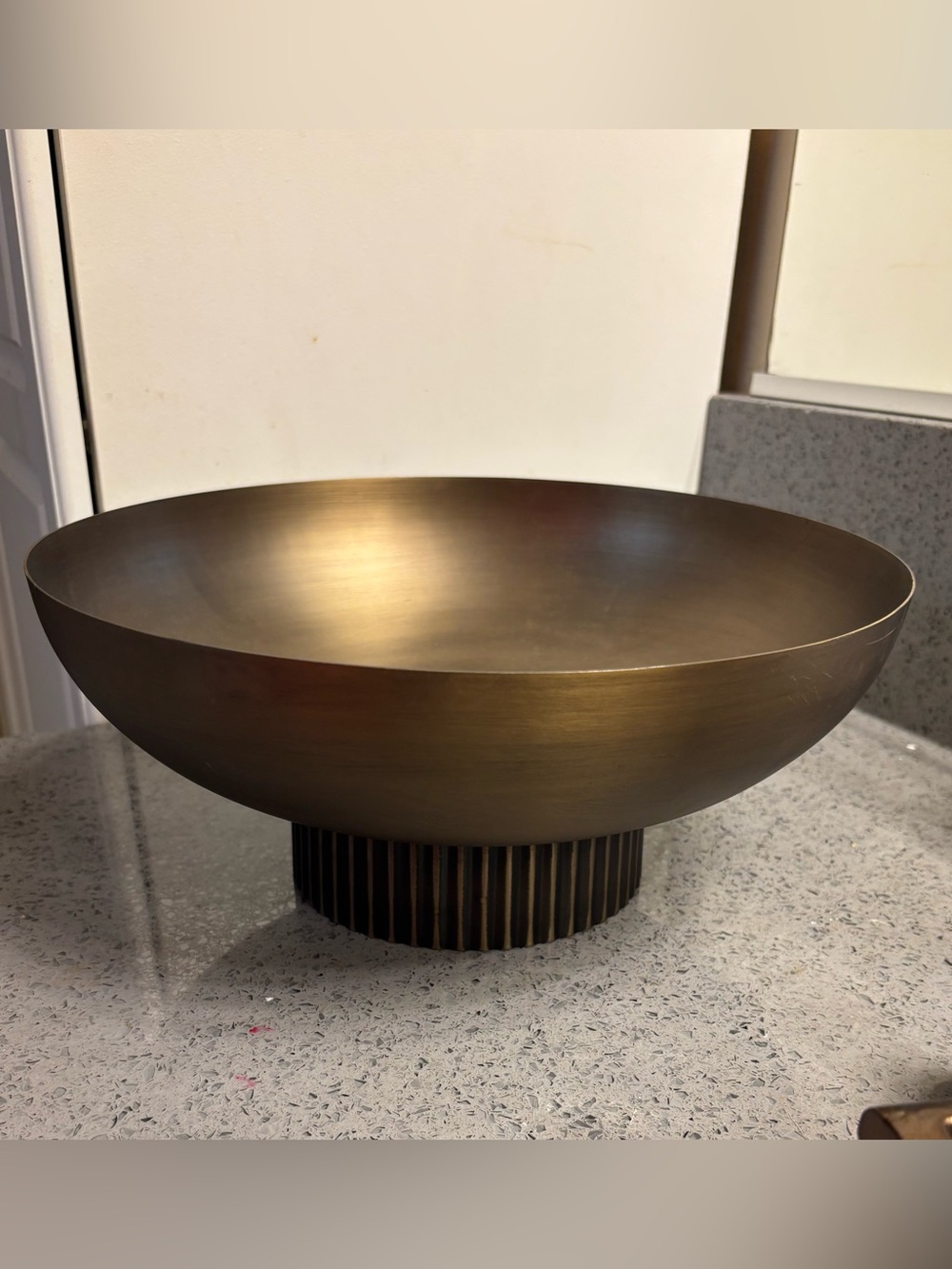 Kate and Laurel Rooks ribbed metal bowl, featuring a textured pedestal